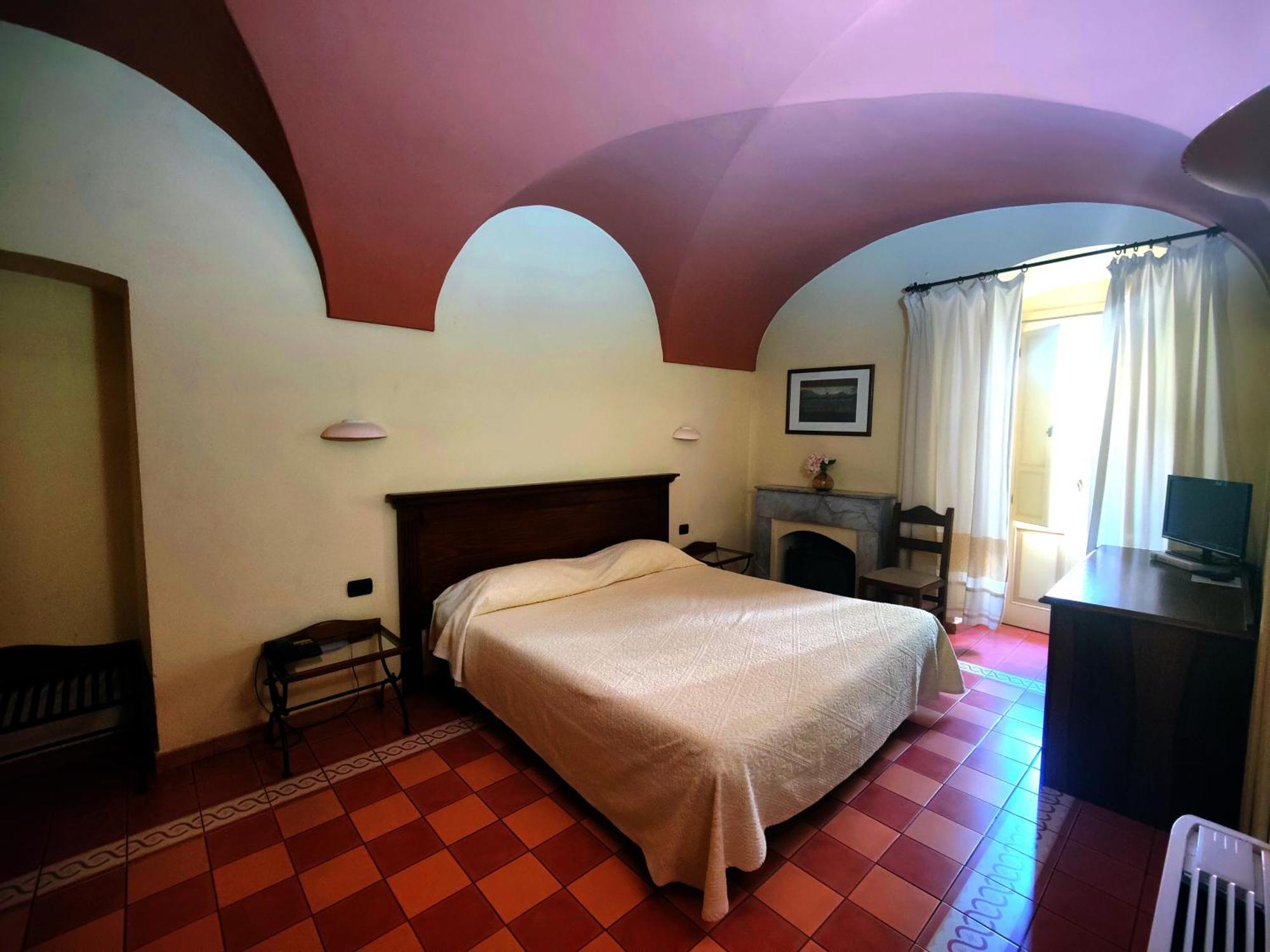 Corte Fiorita Albergo Diffuso Боса Экстерьер фото